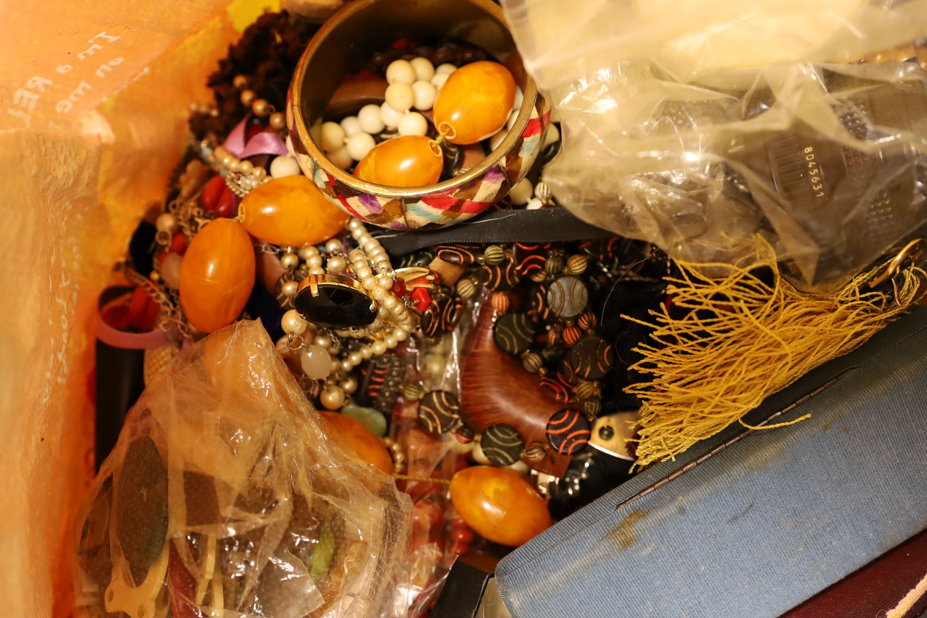 A large quantity of mainly assorted costume jewellery etc. including glass, ceramics and watches.